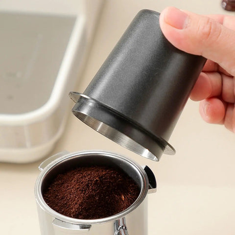 Hand holding lid above Pro Grade Rustproof Coffee Grounds Dispenser For Home And Commercial Use Keeps Mess Down with Accurate Dosing