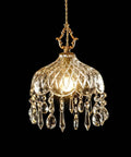 Top Shelf Vintage Crystal Pendant Light With Dope Diamond Cut Glass Shade And Legit Brass Accents Adjustable 0.5 To 70 Inch Cord hanging over black background.