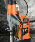 Heavy Duty Mag Drill Kit For Steel Plate Metal Fabrication featuring a portable magnetic drill press with annular cutter attached.