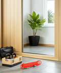 Heavy Duty Recoil Air Hose For Compressor 19.7 Ft Flexible Retractable Line Handles Shop Abuse Without Breaking A Sweat Great Replacement For Garage Tools And Air Supply Systems High Build Quality Resists Wear And Tear Like A Real Pro In The Garage. orange coiled air hose on floor