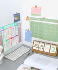 Desk setup with Multiplication Chart Stickers 4 By 5 Inch Large Educational Math Labels For Kids 50 Pack Classroom Posters displayed