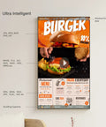 Heavy Duty 100 Inch Digital Signage Display Featuring Kickass 4K Resolution And Ultra Thin Zero Point Six Eight Bezel showing restaurant menu and burger promotions.