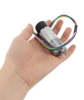 Heavy Duty Electric Micro Geared Motor With Serious Torque And Tough Metal Build Serving Butter Smooth Low RPM Spins For Fan Mods And Quick Gearbox Swaps You Seriously Cannot Live Without in hand to show size.