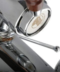 Close-up of the Chrome Brass finish and Bottomless Portafilter of the Straight Fire Manual Lever Espresso Machine.