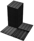 Stacks of Interlocking Plastic Deck Tiles 36 Sq Ft Pack 36 12 by 12 Inches Waterproof Outdoor Flooring in Charcoal Gray