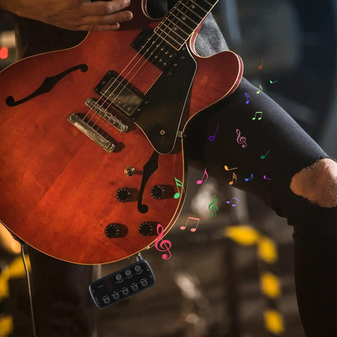 Musician using Mini Guitar Amp You Can Take Anywhere Portable Headphone Guitar Amp With Three Built In Speaker Simulations Plug And Play For Electric Guitar OTG Recording Easy GUI On The Go Practice