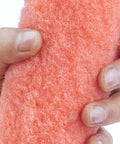 Hand holding a 9-inch high-density polyester roller cover for smooth finishes, part of the 18 Pack 9 Inch Paint Roller Covers With 3 Eighth Inch Nap High Density Polyester Fibers For Smooth And Textured Surfaces Create A Flawless Finish On Walls Ceilings And Woodwork Cut Down On Reloads And Drips.