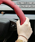 Hand gripping Top Shelf Nappa Leather Steering Wheel Cover With Perforated Breathable Weave, showcasing premium look and comfort.