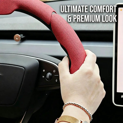 Hand gripping Top Shelf Nappa Leather Steering Wheel Cover With Perforated Breathable Weave, showcasing premium look and comfort.