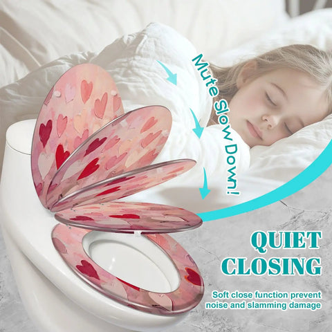 Fun Elongated Toilet Seat Resin for Bathroom Use with heart design in soft close position on toilet.