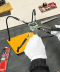 Helping Hands Soldering Station Kit With Four Flexible Arms used for precise electronics work, yellow base visible