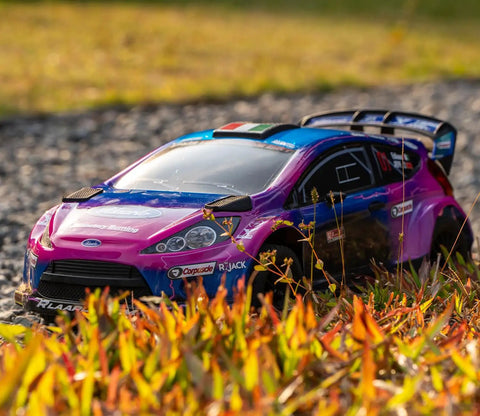 Brushless One Tenth Scale Carbon Fiber RC Drift Car For Adults With Gyro, Fast Up To 50 Mph, All Terrain 2.4GHz 4x4 Hobby RTR RC Truck In Purple on grass