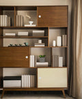 Wooden bookshelf with recessed cabinet pulls featuring 2 Inch Round White Flush Door Pulls Stainless Steel Finger Handles and decor items