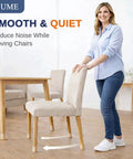 Woman demonstrating Silicone Chair Leg Protectors Fit 0.9 To 1.29 Inches, 32 Count Slip On Floor Caps on hardwood floor.