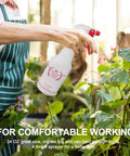 Hand using All Purpose Spray Bottles 4 Pack 24 Oz Heavy Duty Leak Proof Workhorse Sprayers with plants