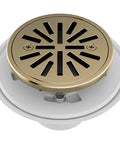 Smooth Draining Four Inch Round Shower Floor Drain With Removable Grate And Solid Gasket for easy installation in brushed gold.