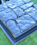 DIY Flagstone Concrete Mold Set 5-Piece Cobblestone Paver Molds for Garden Path shown on grass, durable ABS plastic