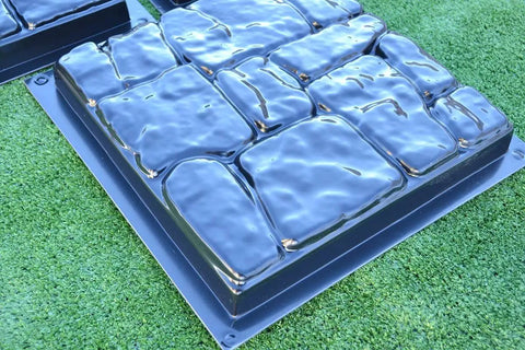 DIY Flagstone Concrete Mold Set 5-Piece Cobblestone Paver Molds for Garden Path shown on grass, durable ABS plastic