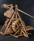 Mini Counterweight Trebuchet With Wheels For Epic Medieval Siege Chariot Catapult Kit DIY 3D Wooden Puzzles Mechanical Model Kit For STEM Projects And Tabletop Play Fun Build It Yourself Toy, wooden model side view