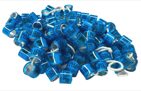 Pile of blue Personalized Pigeon Racing Bands Set, 100 Pcs 8mm Colorful Leg Rings With Loft Name, Year And Unique Number For Easy Identification And Tracking, Durable ID Bands For Racing Birds.