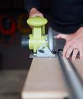 Dead On Aluminum Straight Edge Guide For Table Saw And Router Jig With Heavy Duty Grip Clamp And 24 Inch Fence in use with a cutting tool on wood surface.