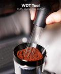 Level Up Your Home Cafe Setup With This Premium 58Mm Espresso Tamper And Coffee Distributor Bundle Including A Sharp WDT Tool For Even Distribution And Nailed Every Single Pull. Close-up of WDT tool stirring coffee grounds.