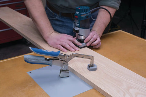 Automaxx Heavy Duty Bench Clamp System with automatic thickness adjustment clamping wood on workbench in steel shop