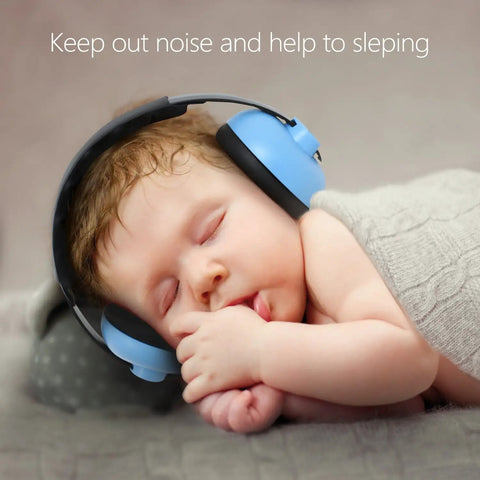 Sleeping baby wearing blue ear protection headphones with noise canceling earmuffs for infants ages 3 months to 3 years.