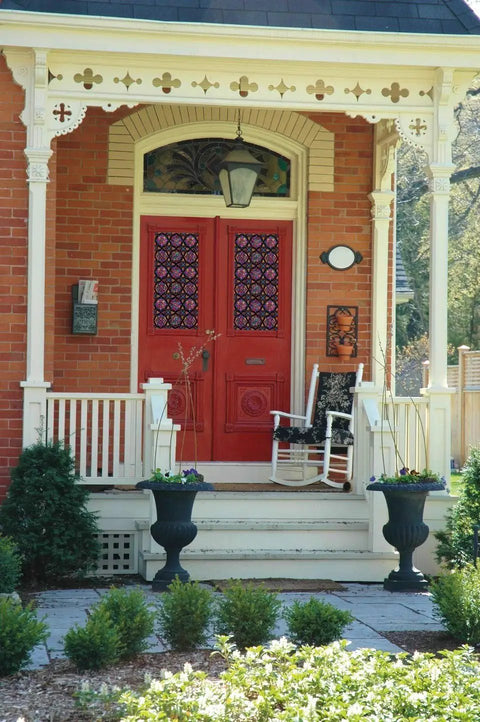 Front view of red door with Lancaster Stained Glass Window Privacy Film With Static Cling Two Way Day And Night UV Blocking 95 Percent Removable Decorative Vinyl Covering For Home Doors And Bathrooms 26.5 X 59 Inches.