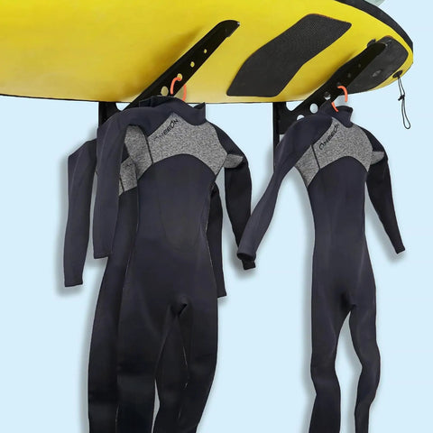 Heavy Duty Adjustable Surfboard Wall Rack And Multi Board Storage Organizer Built For Gnarly Sessions And Serious Shredding Without Any Fuss Or Drama Ever with wetsuits hanging.