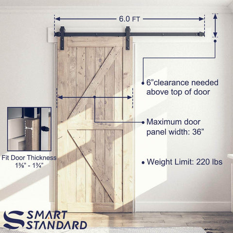 Heavy Duty Sliding Barn Door Hardware Kit For 6-Foot Track System With Smooth Quiet Glide For 36-Inch Doors installed on wood door