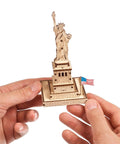 Statue Of Liberty 3D Puzzle Kit, 46 Piece Wooden DIY Model Stands 5.7 Inches, Easy Build No Glue Needed, World Cities Collection, Great Gift For Puzzle Buffs And History Lovers. Wooden Statue of Liberty model with US flag