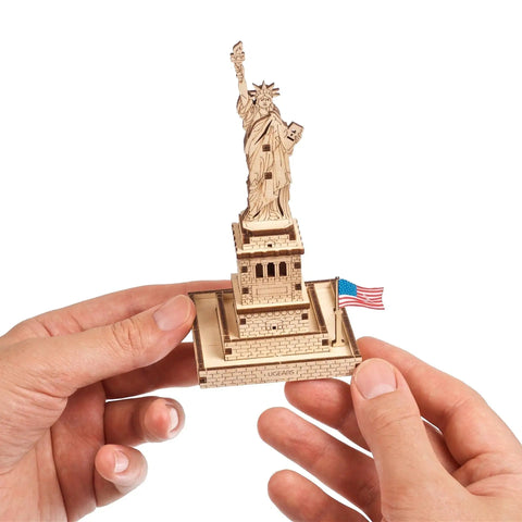 Statue Of Liberty 3D Puzzle Kit, 46 Piece Wooden DIY Model Stands 5.7 Inches, Easy Build No Glue Needed, World Cities Collection, Great Gift For Puzzle Buffs And History Lovers. Wooden Statue of Liberty model with US flag