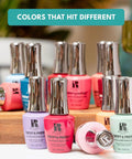 Assorted bottles of Hollywood Vibes Hema Free Gel Nail Polish Delivers Long Lasting Chip Resistant Manicure For Weeks Safe For Sensitive Skin 9ml Bottle Premium Salon Quality Gel Polish Without Hema Or Di Hema on a wooden stand.