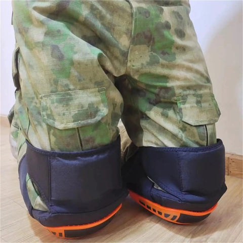 Close-up of Two Piece Heavy Duty Knee Pads Featuring Thick Gel Cushion And Secure Non Slip Straps engineered for flooring tasks in vibrant orange.