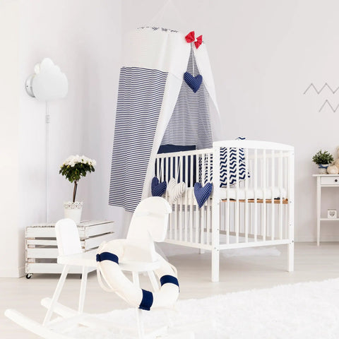 Floating Cloud Plug In Wall Sconce In Matte White With 6ft Clear Cord, 1 Light Ambient Bedroom Lighting over a nursery crib.