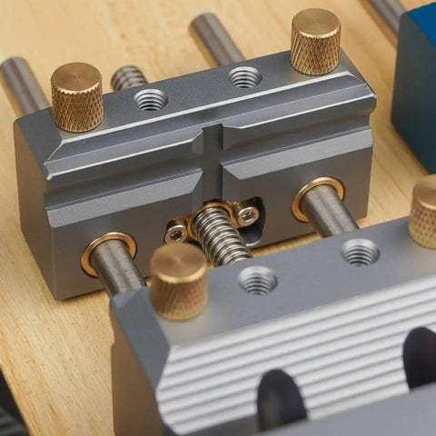 Close-up of Premium Blue Aluminum Bench Vise With Sliding Screw And Brass Jaws for CNC Machining and precise clamping.