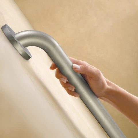 Hand holding 36 Inch Stainless Steel Handicap Grab Bar For Bathtub And Shower With Peened Grip Texture Concealed Screws