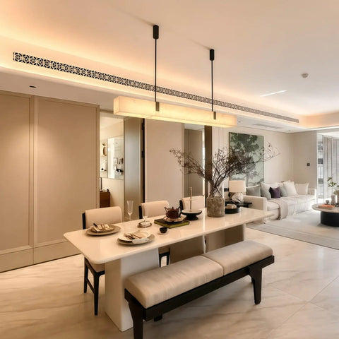 Artpad 47.24-Inch Modern Long Marble Dining Pendant Light, Suspension Lamp above a minimalist dining table in an elegant interior.