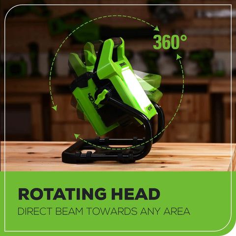 40V 2000 Lumen LED Work Light with 360 Degree Rotating Head on wooden surface, showcasing flexibility in beam direction.