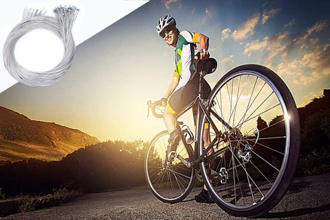 Cyclist riding a road bike at sunset with 10 Pcs Stainless Steel Shifter Cables For Bikes 2M Length shown in top corner.