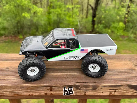 SCX24 1 By 24 Scale Sticker Sheet Pack Premium Retro OG Style Decals on RC car, side view, outdoors