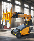 Built Tough Electric Vacuum Suction Lifter Cart With Rock Solid Support Legs For Easy Glass Assembly And Smooth Steel Plate Handling On Busy Construction Sites in a warehouse.