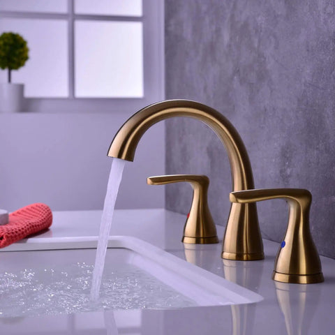 Two-Handle 8-Inch Gold Widespread Bathroom Faucet With Pop-Up Drain, Three-Hole Basin Mixer Faucet, Brushed Gold Finish shown in use