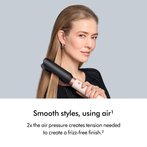 Woman styling hair with Coanda 2x Airwrap Multi Styler And Dryer For Straight And Wavy Hair In Ceramic Pink, No Heat Damage