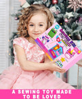 Child holding a Beginner Kids Sewing Kit With 6 DIY Projects Fun Prepunched Fabric Safe Plastic Needle No Glue Arts And Crafts Toy
