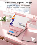 Killer Digital Postal Scale Measures Every Package Up To 66 Pounds With Dead On Precision So You Can Ship Heavy Goods Without Stress While The Sleek Pink Surface Looks Absolutely Dope, displaying a FedEx envelope on an innovative flip-up mail holder.