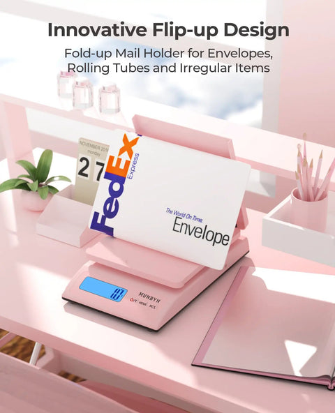 Killer Digital Postal Scale Measures Every Package Up To 66 Pounds With Dead On Precision So You Can Ship Heavy Goods Without Stress While The Sleek Pink Surface Looks Absolutely Dope, displaying a FedEx envelope on an innovative flip-up mail holder.