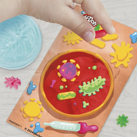 Light-Up Microscope Toy For Kids With Glow Reveal And 9 Accessories In 5 Colors, showing slide on nature mat