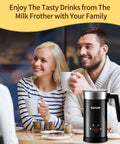 People drinking coffee with 4 In 1 Electric Milk Frother And Warmer With Large 10oz Capacity Delivers Dense Hot Foam Or Light Foam Heats Milk Or Froths Cold Milk For Lattes Cappuccinos Macchiatos And Hot Chocolate With One Button nearby.